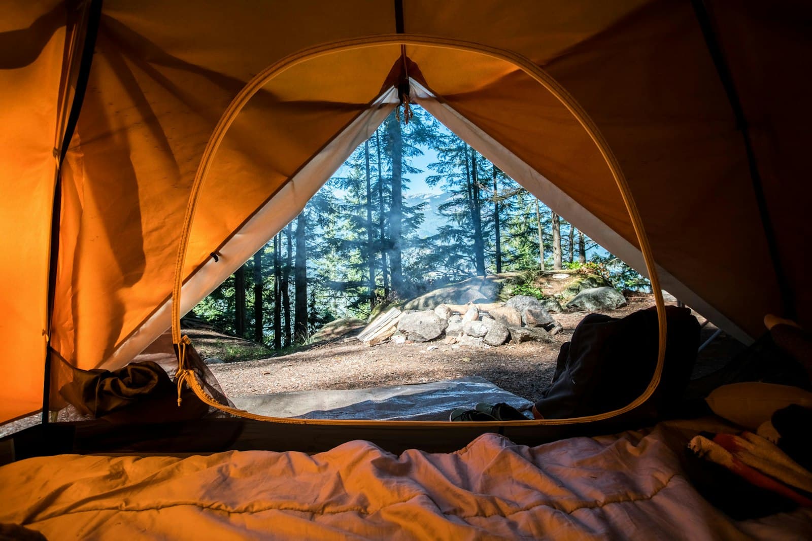 Tents at a summer camp under open sky